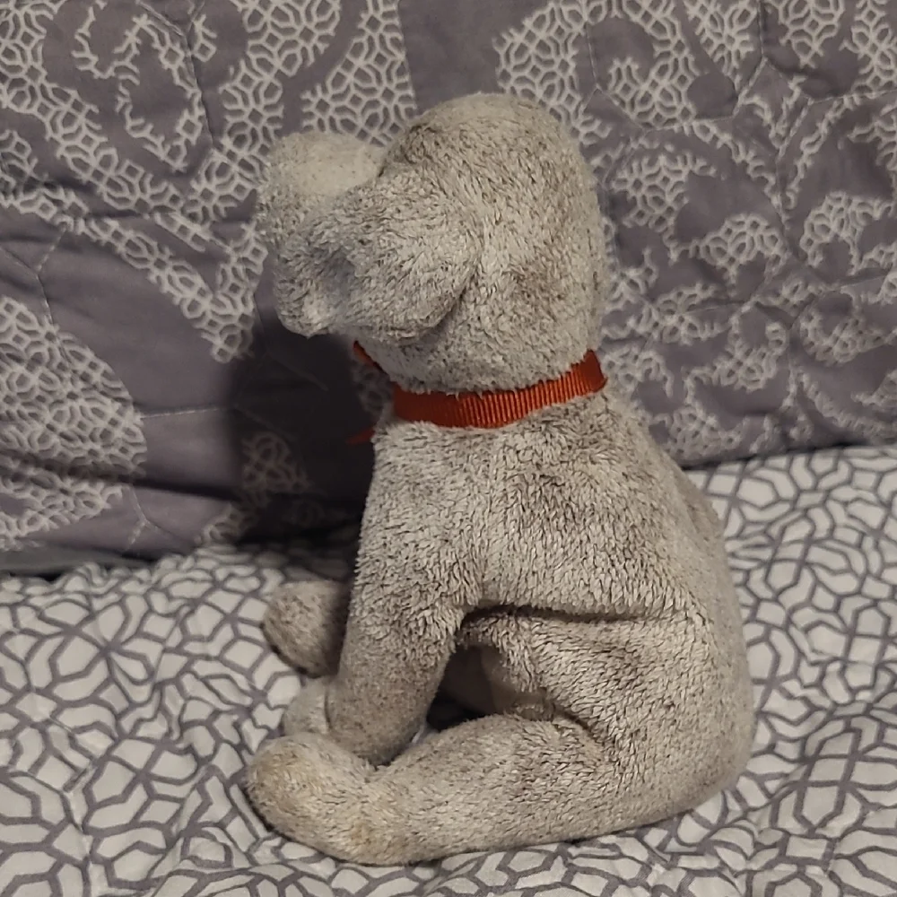 Plush Dog Toy with Red Bow